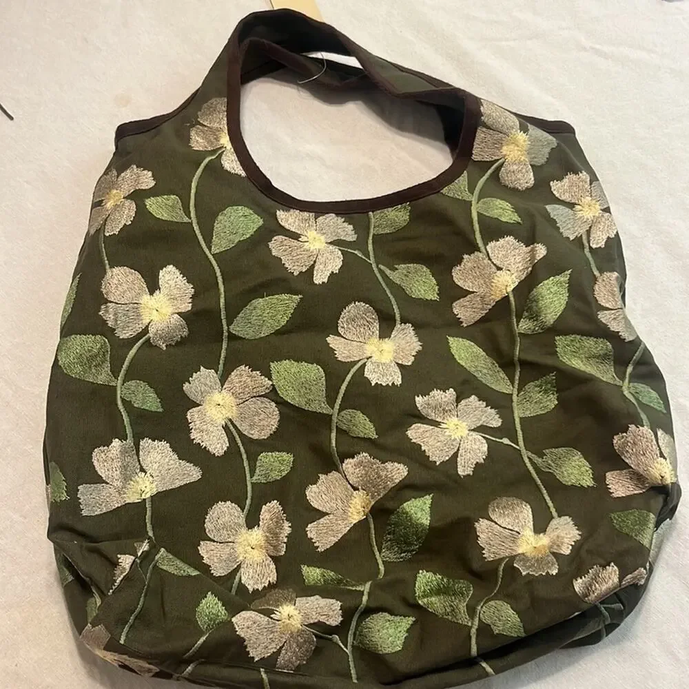 New with tags Coldwater Creek embroidered hobo bag.